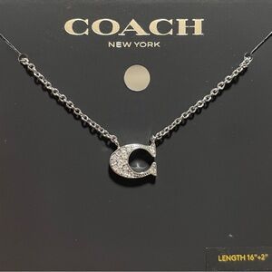 Coach Elegant Silver Pendant Necklace with Crystal Accents